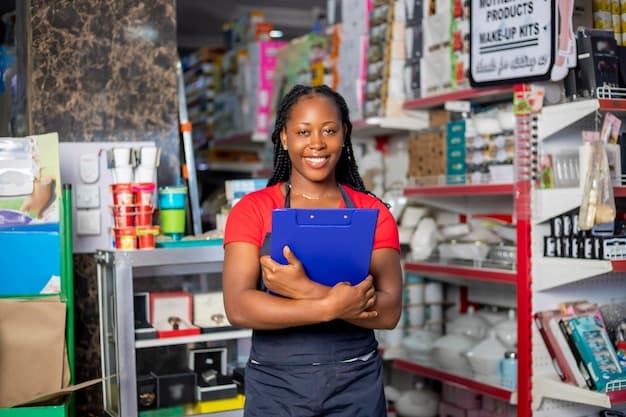 Smiling business owner using a tablet